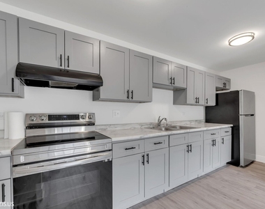 1955 N Hicks Road - Photo Thumbnail 4