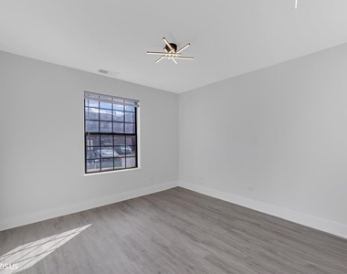 1955 N Hicks Road - Photo Thumbnail 11