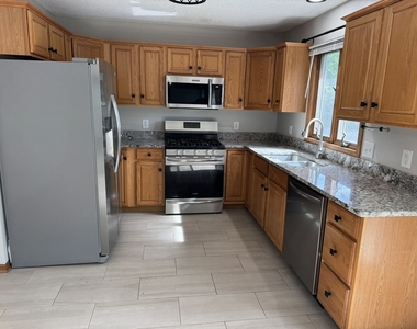 6303 Wilkes Avenue - Photo Thumbnail 5