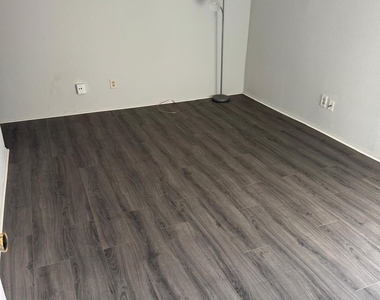 10603 S Wilcrest Drive - Photo Thumbnail 1