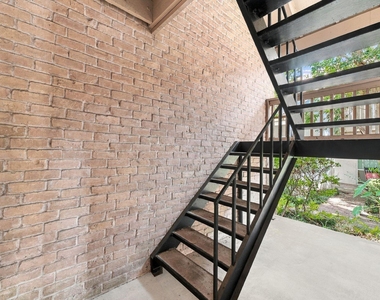 2100 Tanglewilde Street - Photo Thumbnail 4