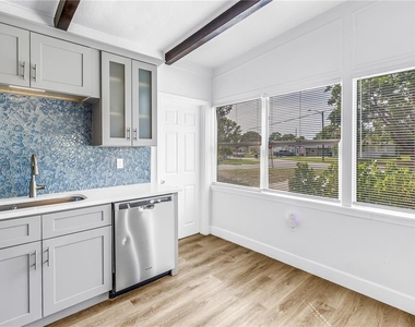 7599 Meadowlawn Drive N - Photo Thumbnail 13