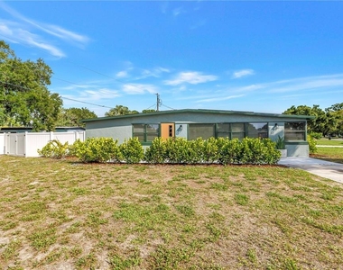 7599 Meadowlawn Drive N - Photo Thumbnail 2