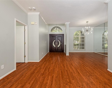 9317 Heritage Oak Court - Photo Thumbnail 3