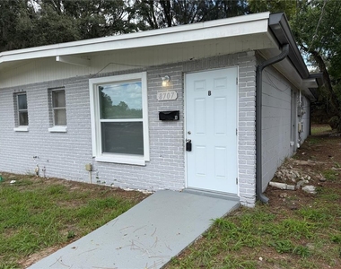 8707 N Mandarine Place - Photo Thumbnail 1