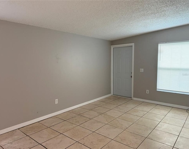 8707 N Mandarine Place - Photo Thumbnail 4