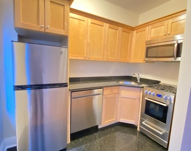 E 56th St - Photo Thumbnail 3