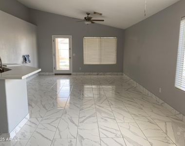 8022 W Salter Drive - Photo Thumbnail 8