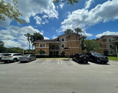 9033 Wiles Road - Photo Thumbnail 1