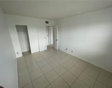 9033 Wiles Road - Photo Thumbnail 15