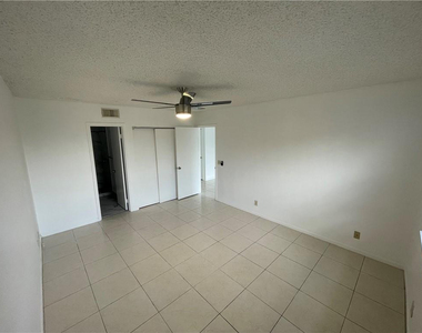 9033 Wiles Road - Photo Thumbnail 12