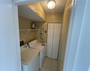 9033 Wiles Road - Photo Thumbnail 17