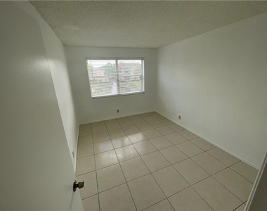9033 Wiles Road - Photo Thumbnail 14