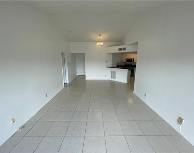 9033 Wiles Road - Photo Thumbnail 7