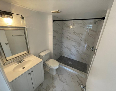9033 Wiles Road - Photo Thumbnail 13