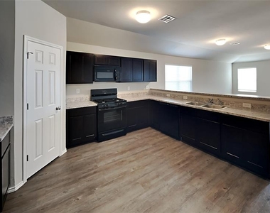 9905 Rattlesnake Lane - Photo Thumbnail 3