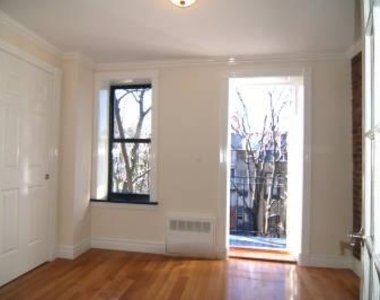 334 East 6th Street - Photo Thumbnail 4