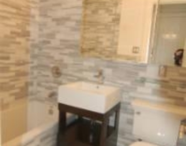 334 East 6th Street - Photo Thumbnail 2