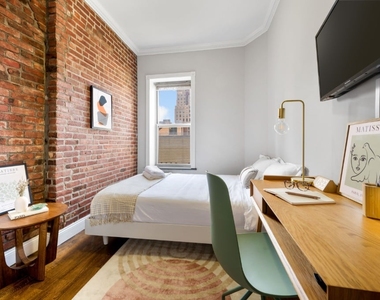 437 West 53rd Street - Photo Thumbnail 4