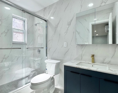 83-15 Grand Avenue - Photo Thumbnail 3