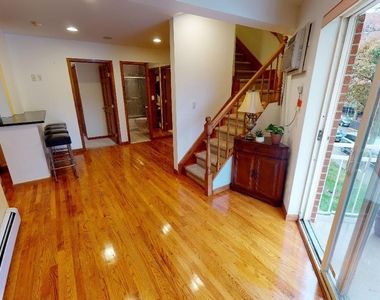 67-08 Exeter Street - Photo Thumbnail 1