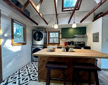 332 Canoe Place Road - Photo Thumbnail 2