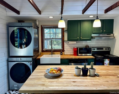 332 Canoe Place Road - Photo Thumbnail 1