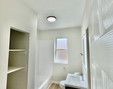7833 S Colfax Avenue - Photo Thumbnail 6
