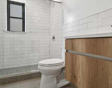 W 58th St - Photo Thumbnail 7