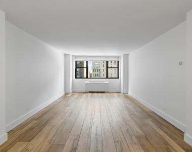 W 58th St - Photo Thumbnail 3
