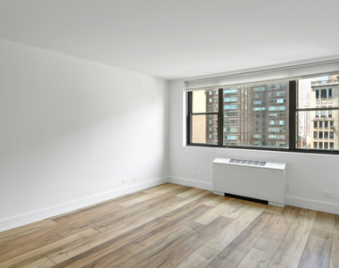 W 58th St - Photo Thumbnail 1