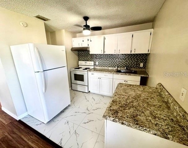 2305 E 23rd Avenue - Photo Thumbnail 5