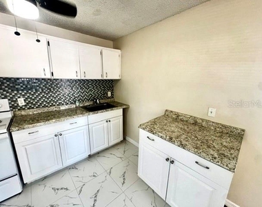2305 E 23rd Avenue - Photo Thumbnail 7