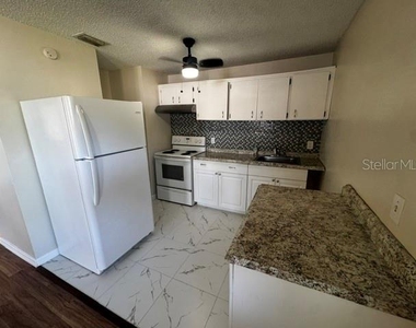 2305 E 23rd Avenue - Photo Thumbnail 6