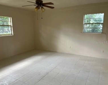 4921 Nw 37th Drive - Photo Thumbnail 4