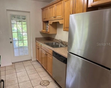 4921 Nw 37th Drive - Photo Thumbnail 2