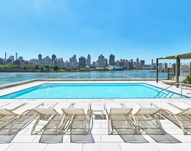 LUXURY WATERFRONT LIVING IN ASTORIA - Photo Thumbnail 4