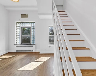 East 31 Street - Photo Thumbnail 2
