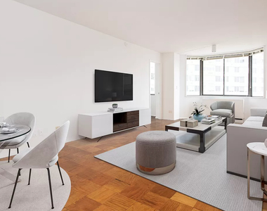 E 52nd St - Photo Thumbnail 1
