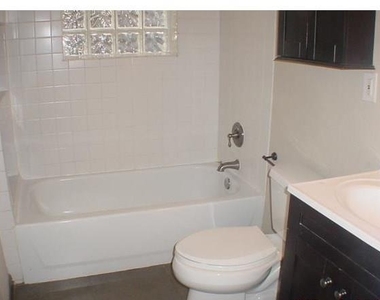 1122 N Zang Boulevard - Photo Thumbnail 4
