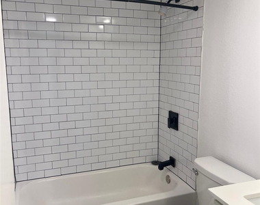 321 E 8th Street - Photo Thumbnail 7
