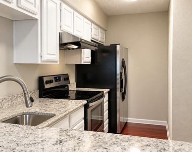 8545 Midpark Road - Photo Thumbnail 8