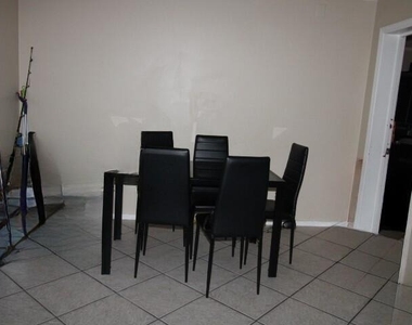 1488 W 31st Street - Photo Thumbnail 4