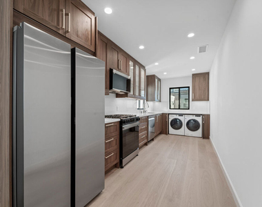 160 N Almont Drive - Photo Thumbnail 2