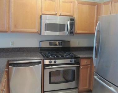 7111 Woodmont Avenue - Photo Thumbnail 2