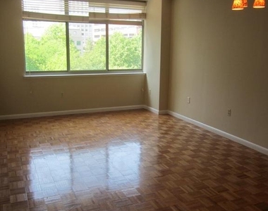 7111 Woodmont Avenue - Photo Thumbnail 1
