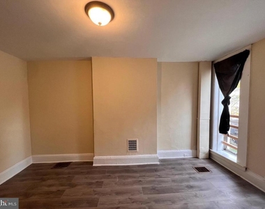 1715 Presstman Street - Photo Thumbnail 2