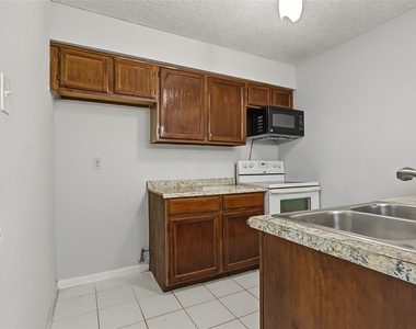 10001 Westpark Drive - Photo Thumbnail 6