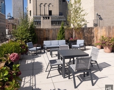 East 34 Street - Photo Thumbnail 2