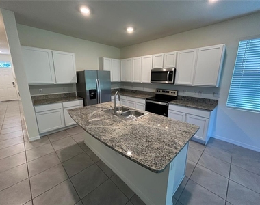 8736 Milestone Drive - Photo Thumbnail 3